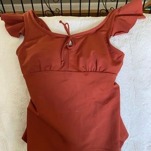 Lime Ricki swim top. Rust in color